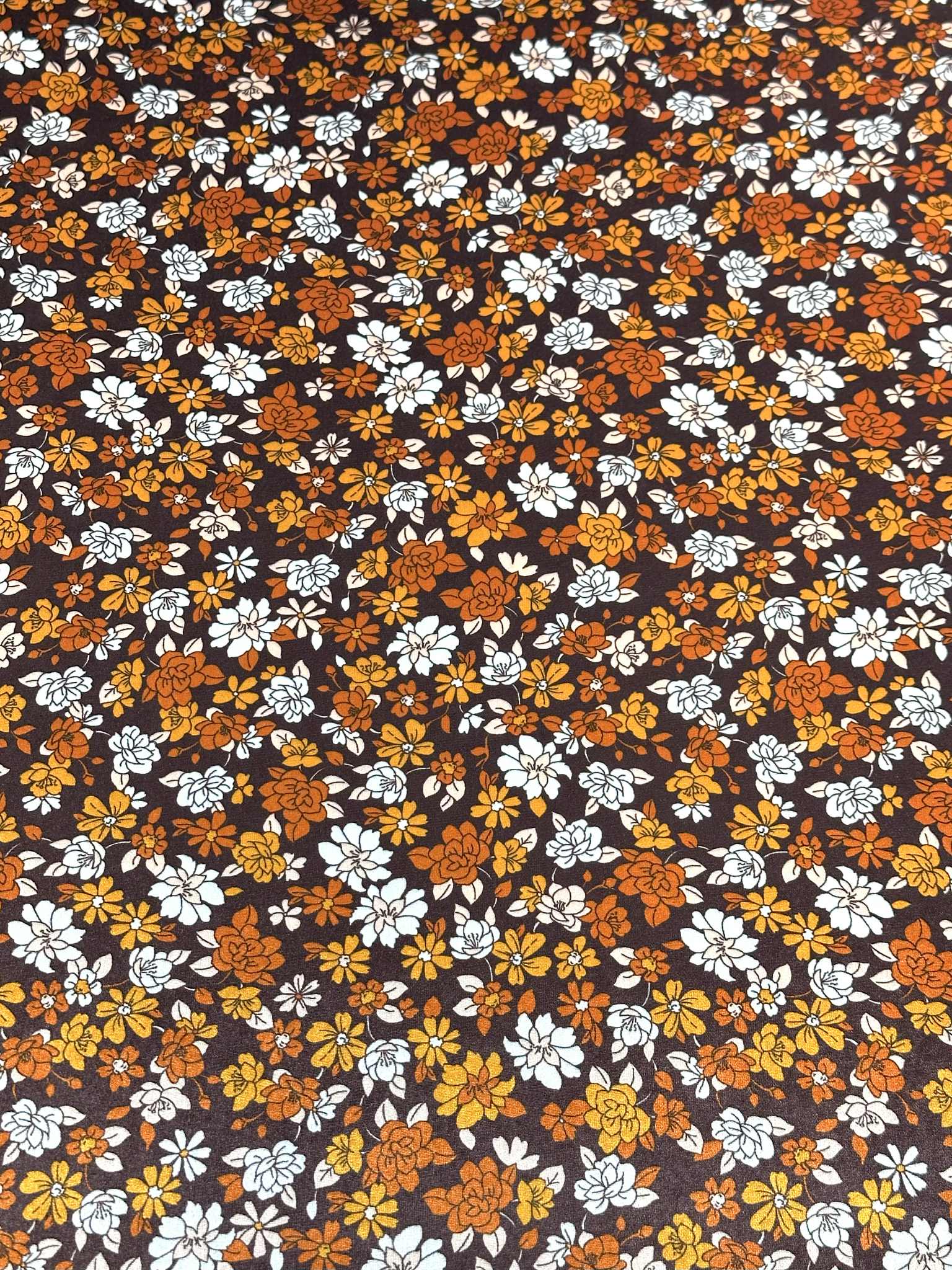 (VELVET) ORANGE AND OFF WHITE FLOWERS ON DARK BROWN