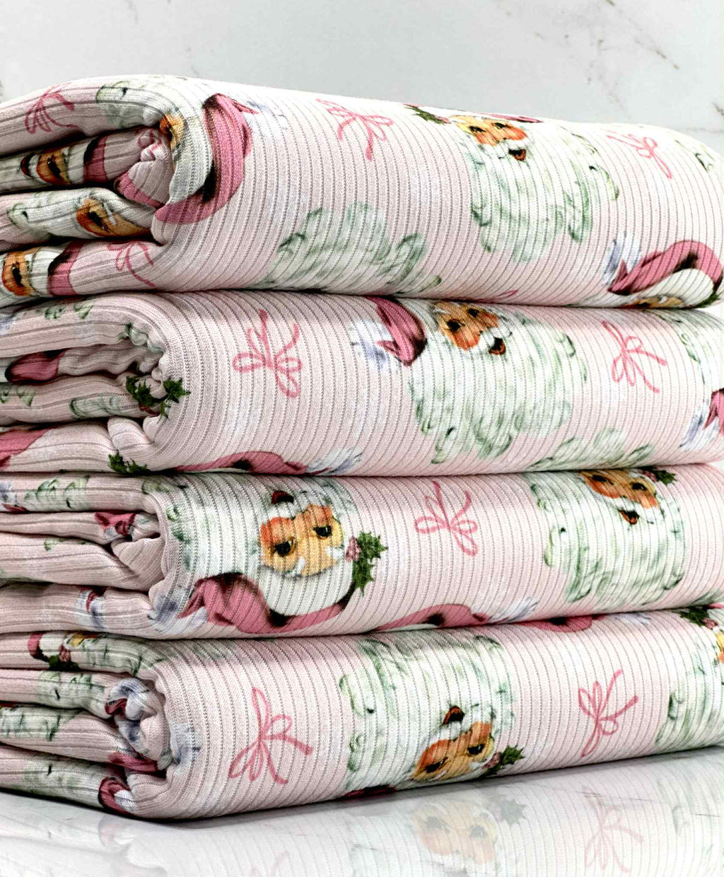 (4X2 RIB) PINK SANTA CLAUS AND TINY BOWS ON LIGHT PINK
