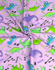 (FRENCH TERRY) DINOSAURS ON LAVENDER