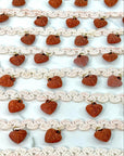 (TRIM) IVORY STRIP WITH VINTAGE HEART CHARMS