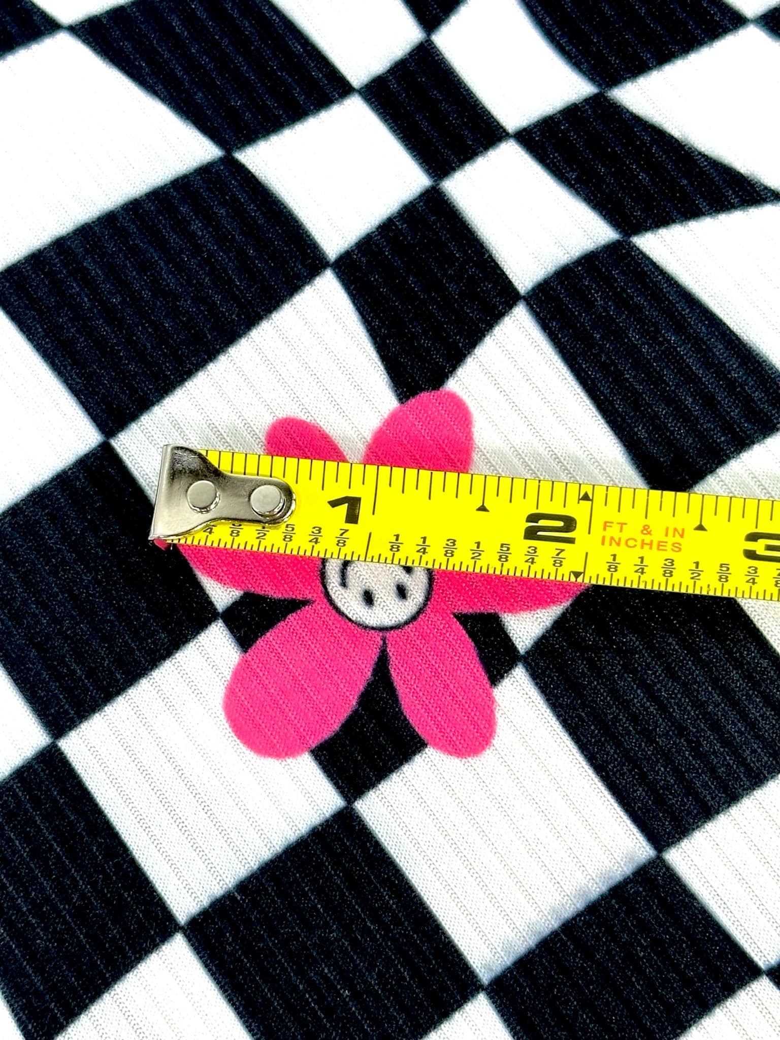 (YUMMY RIB) PINK, WHITE HAPPY FACE FLOWERS ON BLACK CHECKERED WAVE