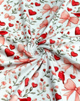 (2X2 BRUSHED RIB) HEARTS, BOWS, FLOWERS, AND RED BIRDS ON OFF WHITE