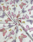 (YUMMY RIB) PINK, PURPLE, AND YELLOW BUTTERFLIES ON OFF WHITE