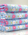 (DBP) LIGHT PINK AND OFF WHITE FLOWER PATTERN ON LIGHT BLUE