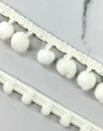 (TRIM) IVORY STRIP WITH SMALL POM POM BALL