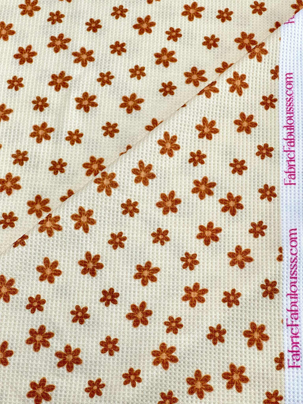 (THERMAL) TINY BURNT ORANGE FLOWERS ON CREAM