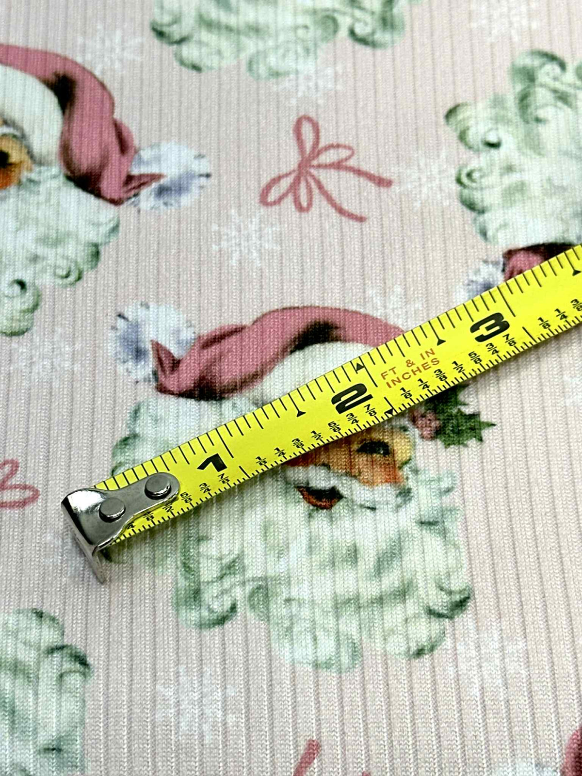 (4X2 RIB) PINK SANTA CLAUS AND TINY BOWS ON LIGHT PINK