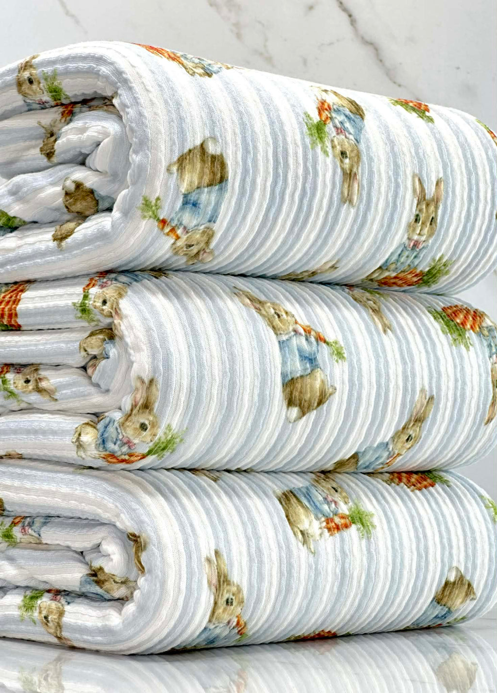 (URBAN RIB) MEDIUM BUNNIES WITH CARROTS ON BLUE STRIPES