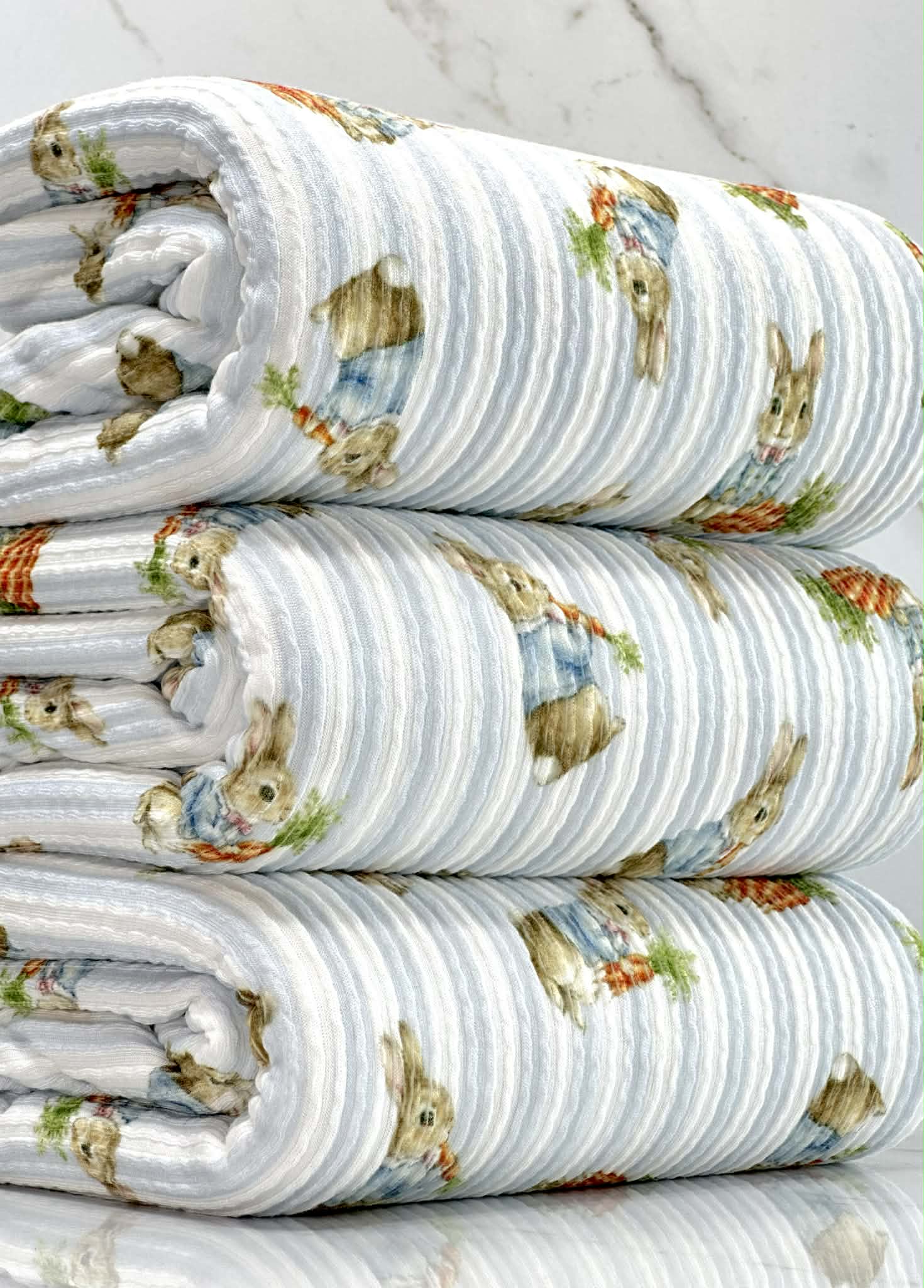 (URBAN RIB) MEDIUM BUNNIES WITH CARROTS ON BLUE STRIPES