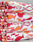 (COTTON BABY RIB) PINK, ORANGE AND RED FISH ON OFF WHITE