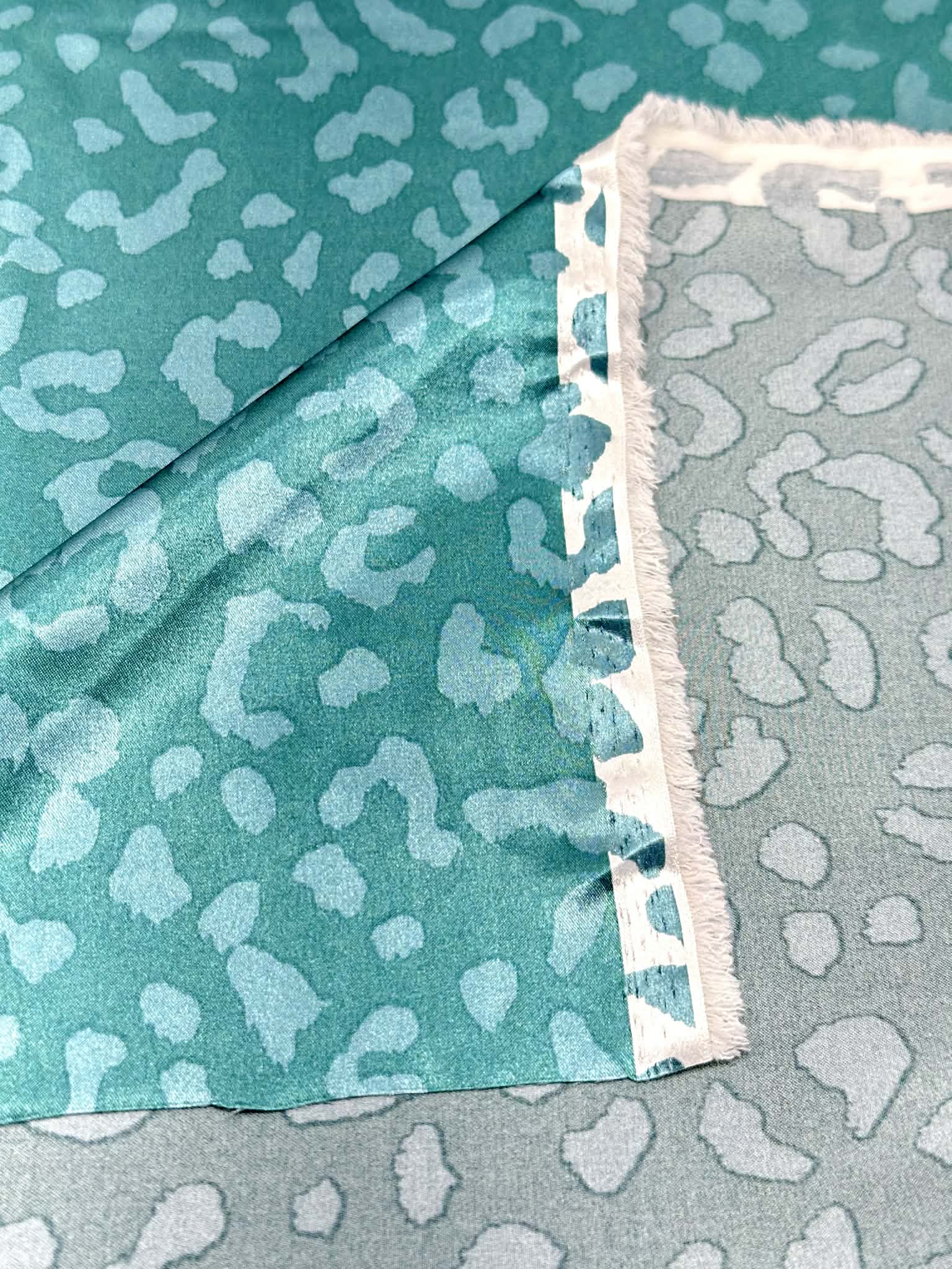 (SATIN) CHEETAH ON TEAL GREEN
