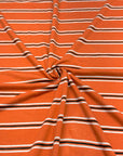 (RAYON MODAL) BLACK AND OFF WHITE STRIPES ON DARK ORANGE
