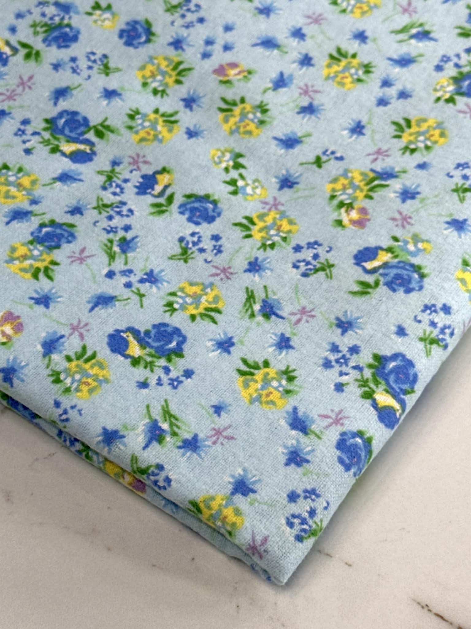 (FLANNEL COTTON) FLORAL PATTERN ON LIGHT BLUE