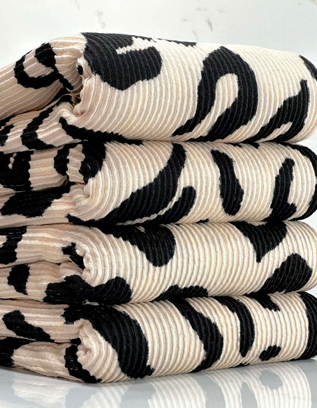 (URBAN RIB) BLACK CHEETAH ON TAN