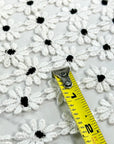 (TRIM) EMBROIDERED WHITE FLOWERS WITH BLACK