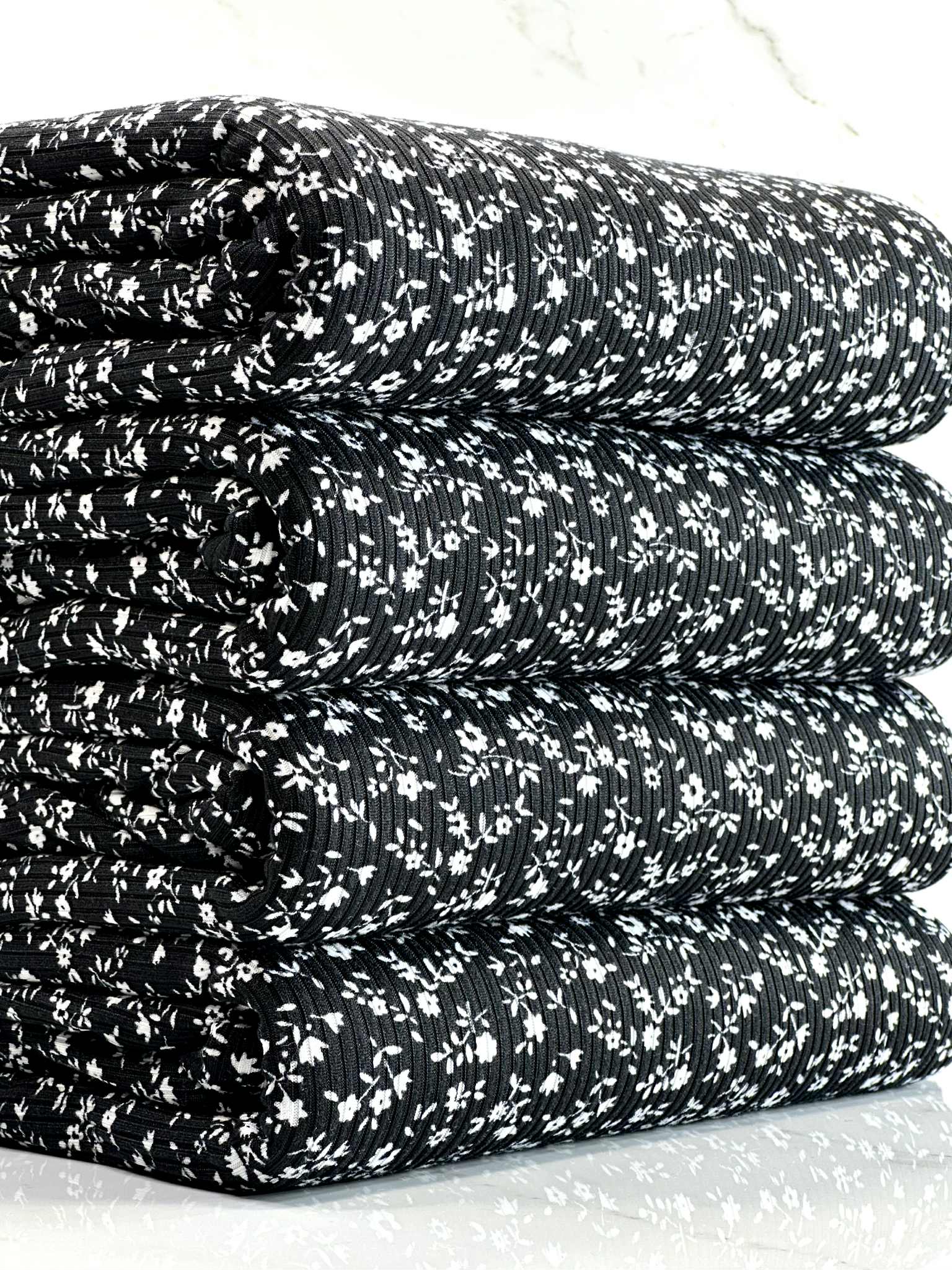 (4X2 YUMMY RIB) TINY WHITE FLOWERS ON BLACK
