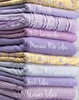 (POINTELLE RIB) LAVENDER, LILAC, AND OFF WHITE TINY FLOWERS ON SOFT YELLOW (1)