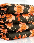 (OAKLEY) ORANGE PUMPKIN FLOWERS AND BOWS ON DARK BROWN