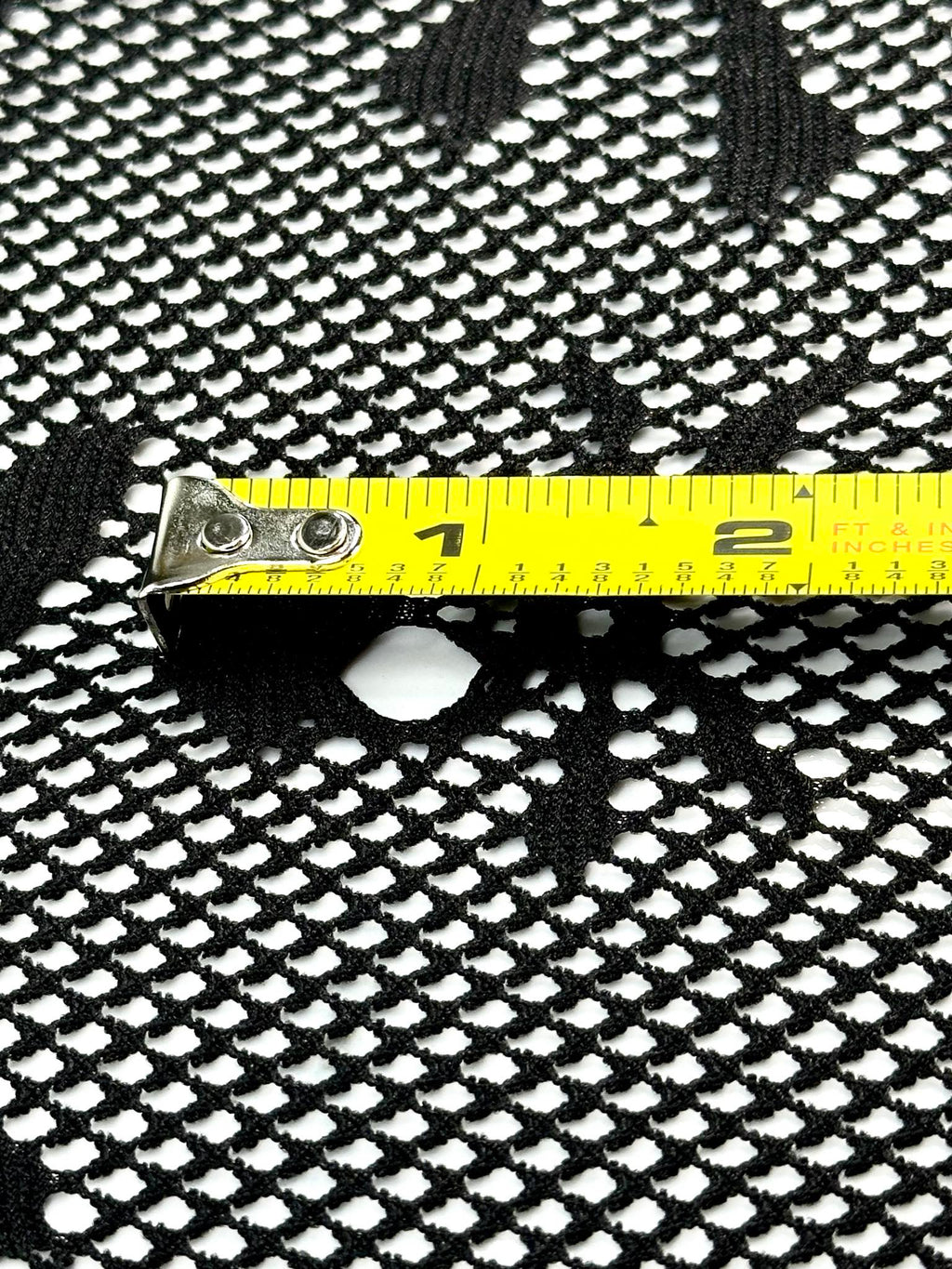 (JERSEY) SMALL AND MEDIUM BLACK SKULLS ON BLACK