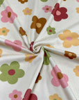 (4X2 RIB) PISTACHIO, BROWN, PINK AND LIGHT MUSTARD DAISIES ON CREAM