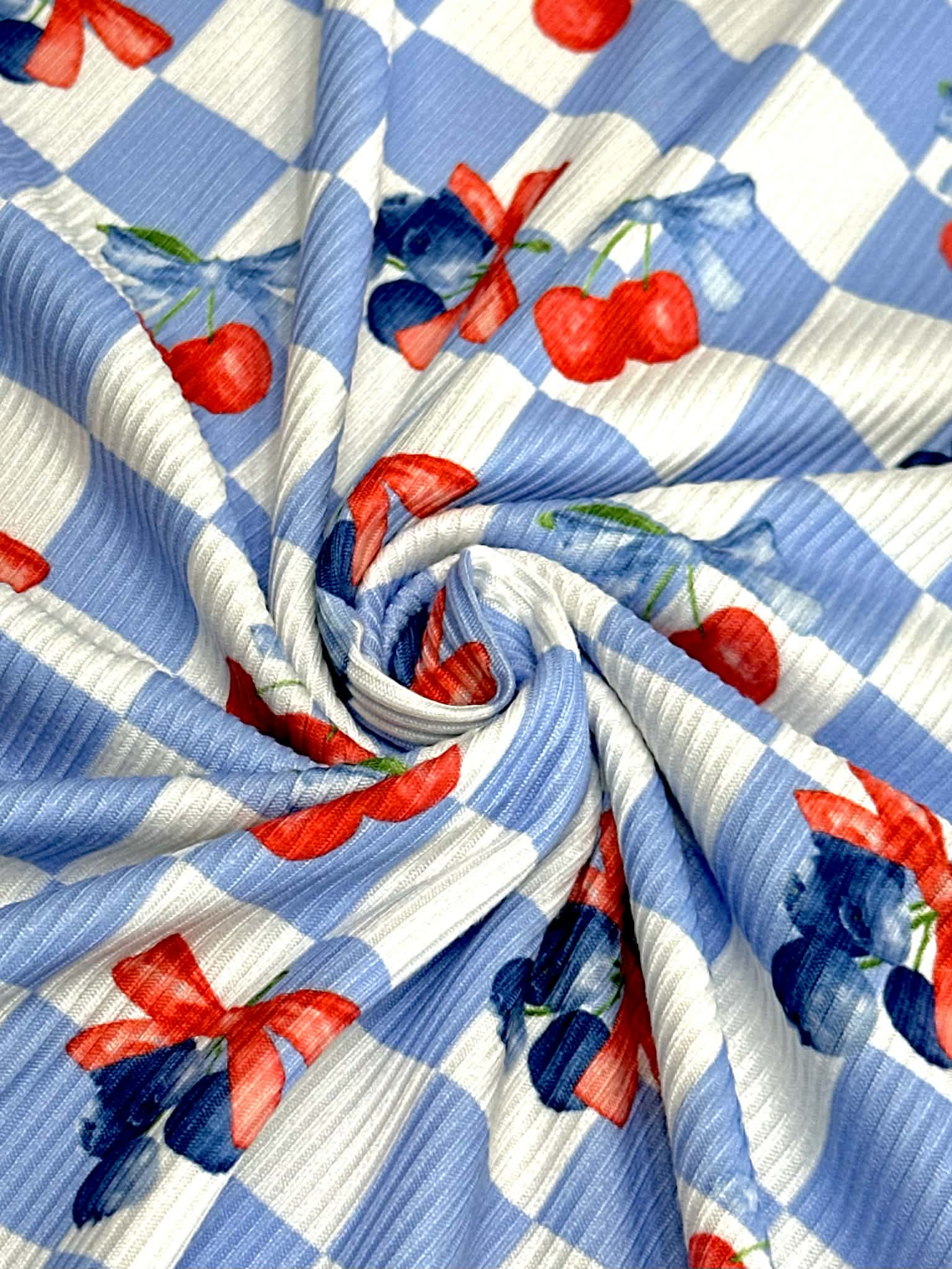 (2X2 YUMMY RIB) CHERRIES AND BLUEBERRIES WITH BOWS ON BLUE AND OFF WHITE CHECKERED