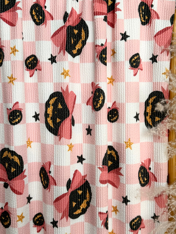 (URBAN RIB) BLACK PUMPKINS WITH BOWS AND STARS ON LIGHT PINK CHECKERED