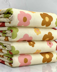 (4X2 RIB) PISTACHIO, BROWN, PINK AND LIGHT MUSTARD DAISIES ON CREAM