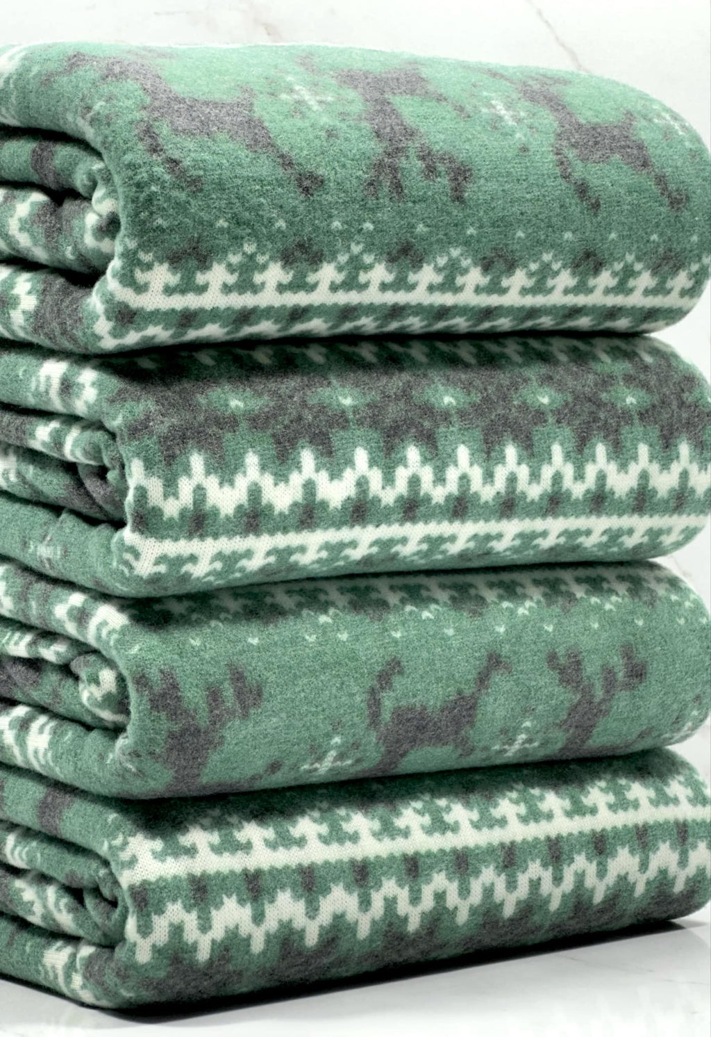 (BRUSHED SWEATER KNIT) BLACK REINDEERS ON DARK GREEN