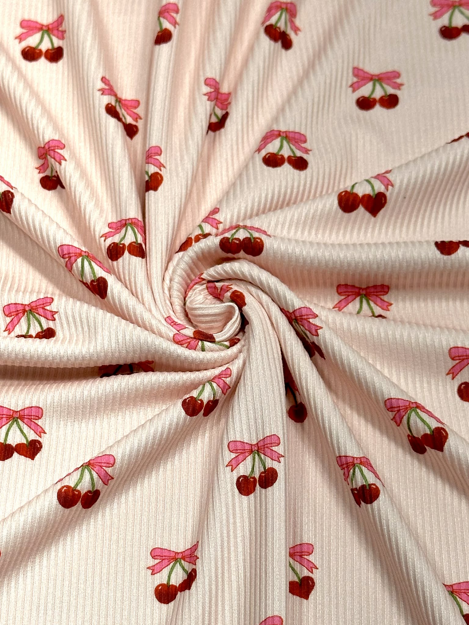 (2X2 BRUSHED RIB) CHERRY HEART WITH BOWS ON BLUSH
