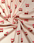 (2X2 BRUSHED RIB) CHERRY HEART WITH BOWS ON BLUSH