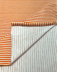 (KNIT) ORANGE AND OFF WHITE THIN STRIPES