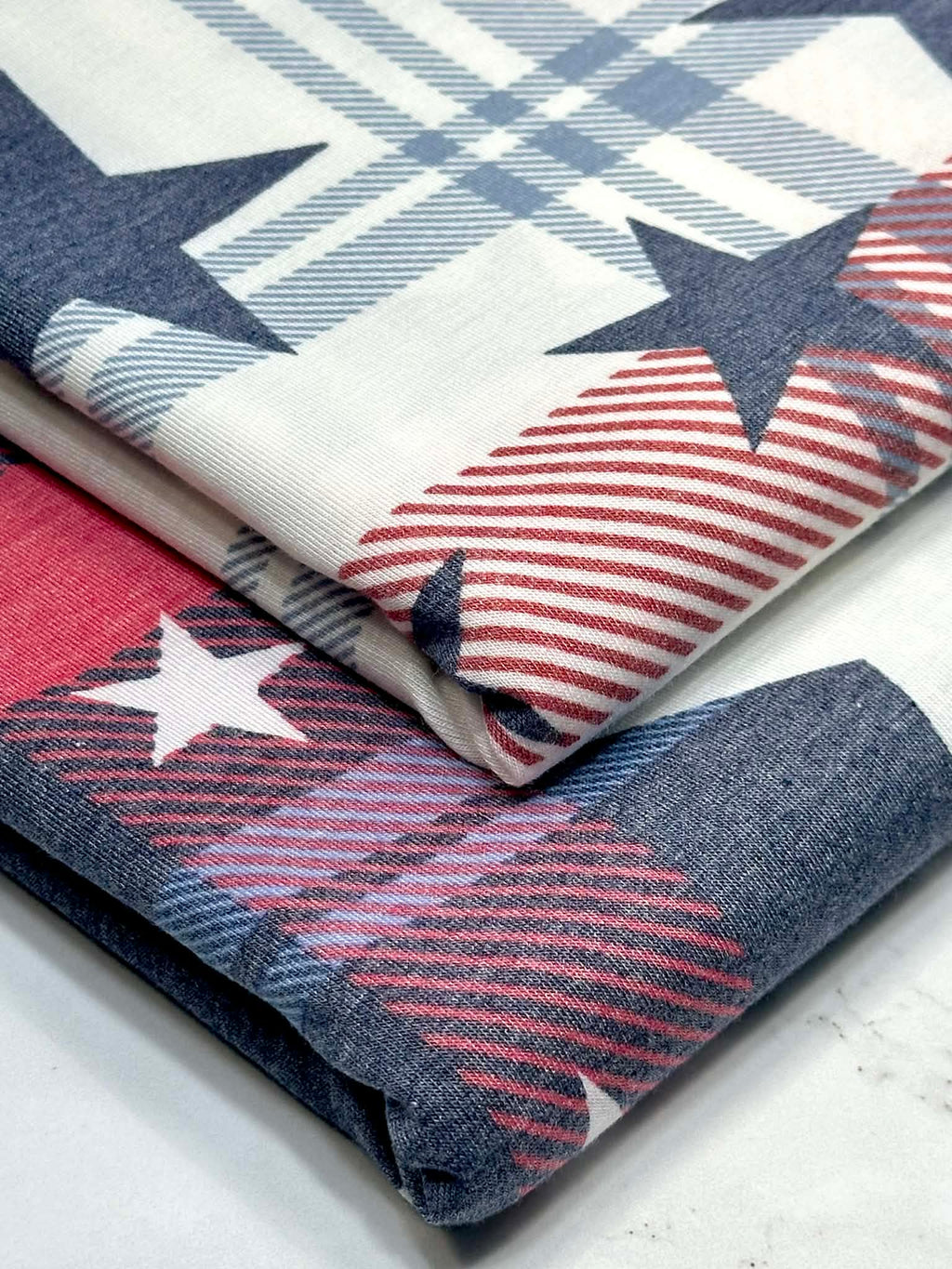 (KNIT) NAVY STARS ON RED, BLUE AND OFF WHITE PLAID