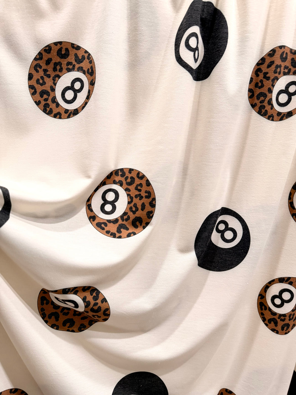 (FRENCH TERRY) BLACK AND LEOPARD 8-BALL PRINT ON CREAM