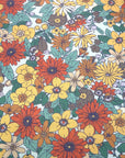 (BELLA RIB) YELLOW, ORANGE, AND BROWN FLOWERS ON SAND (4)