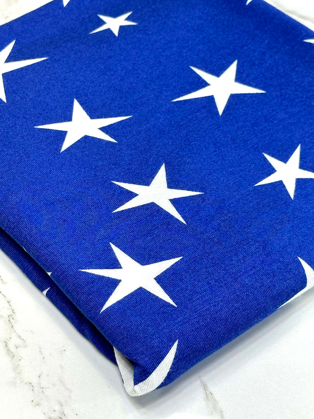 (RAYON MODAL) OFF WHITE STARS ON ROYAL
