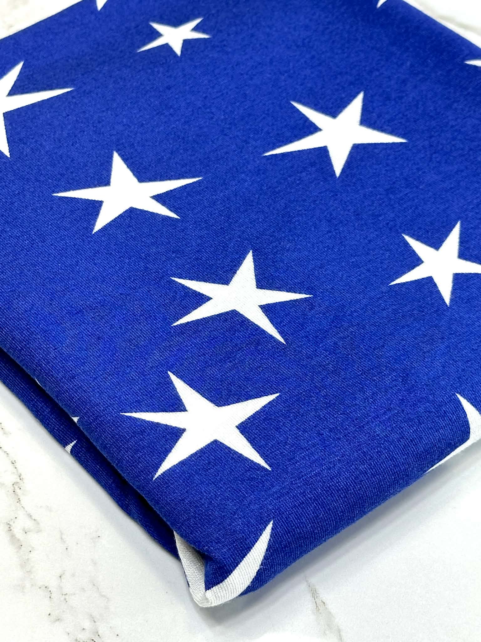 (RAYON MODAL) OFF WHITE STARS ON ROYAL