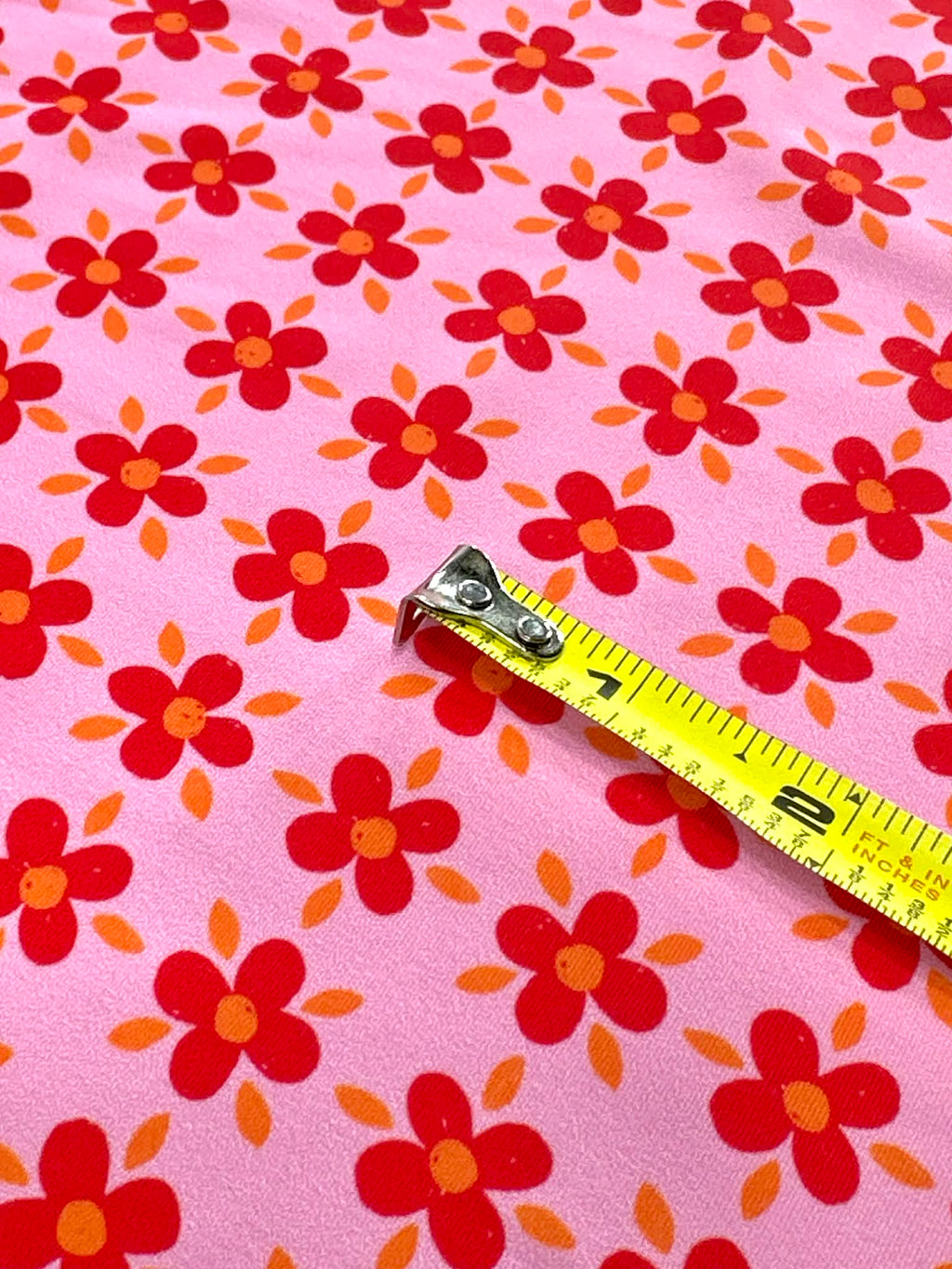(SWIM) RED AND ORANGE FLOWERS ON PINK