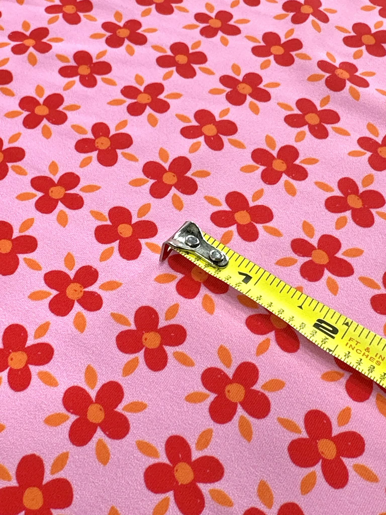 (SWIM) RED AND ORANGE FLOWERS ON PINK