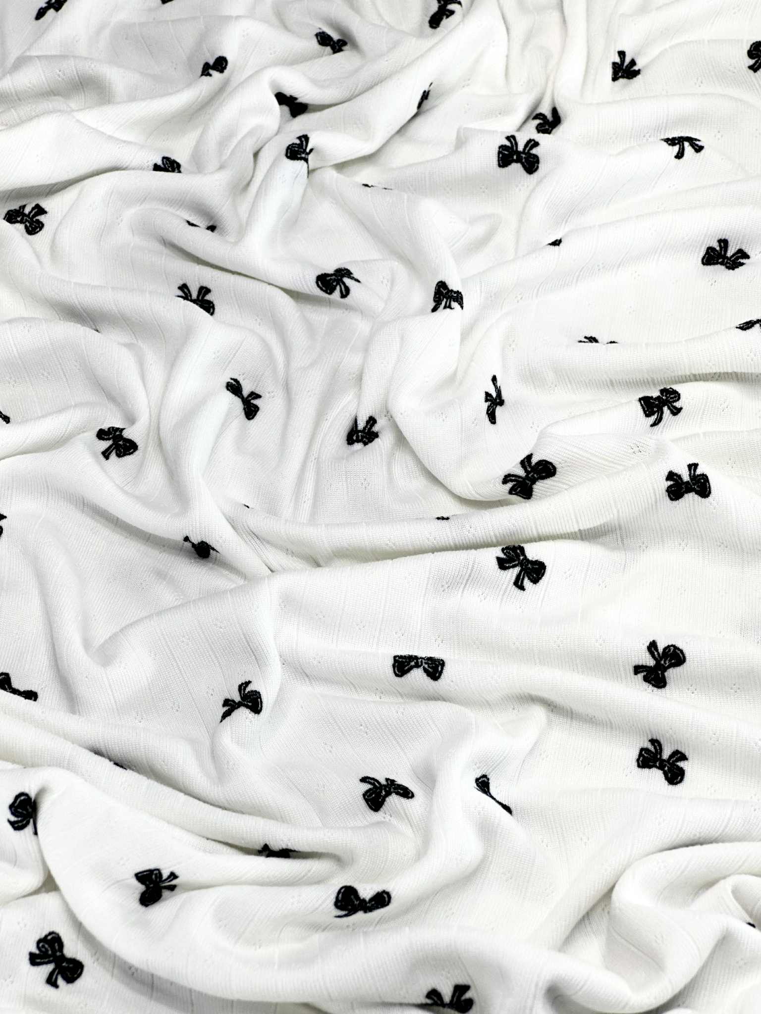 (POINTELLE RIB) BLACK BOWS ON OFF WHITE
