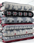 (SWEATER KNIT HACCI) CHARCOAL REINDEERS ON HEATHER GRAY