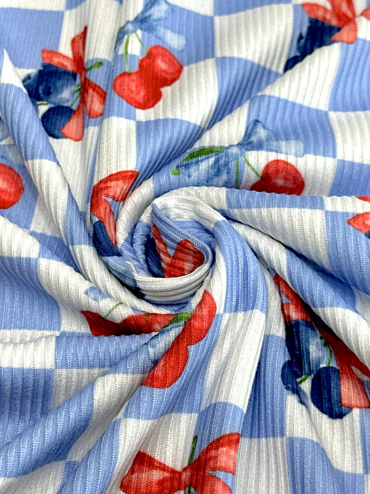 (2X2 YUMMY RIB) CHERRIES AND BLUEBERRIES WITH BOWS ON BLUE AND OFF WHITE CHECKERED