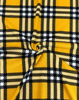 (SWEATER KNIT) LARGE OFF WHITE AND BLACK PLAID ON MUSTARD