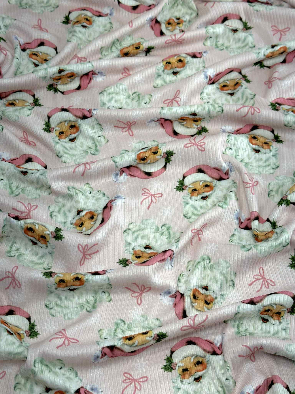 (4X2 RIB) PINK SANTA CLAUS AND TINY BOWS ON LIGHT PINK