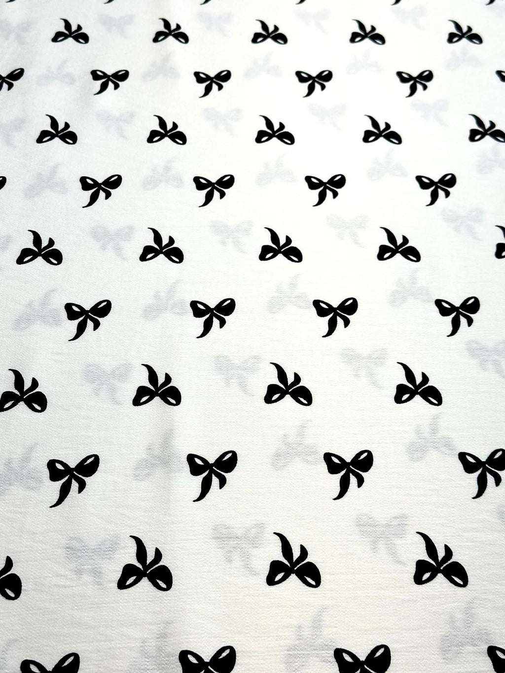 (WOVEN) BLACK BOWS ON OFF WHITE