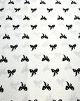 (WOVEN) BLACK BOWS ON OFF WHITE