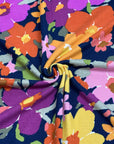 (SWEATER KNIT) PURPLE, ORANGE, YELLOW AND PINK FLOWERS ON NAVY