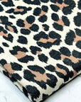 (FRENCH TERRY) BROWN AND BLACK CHEETAH ON CREAM