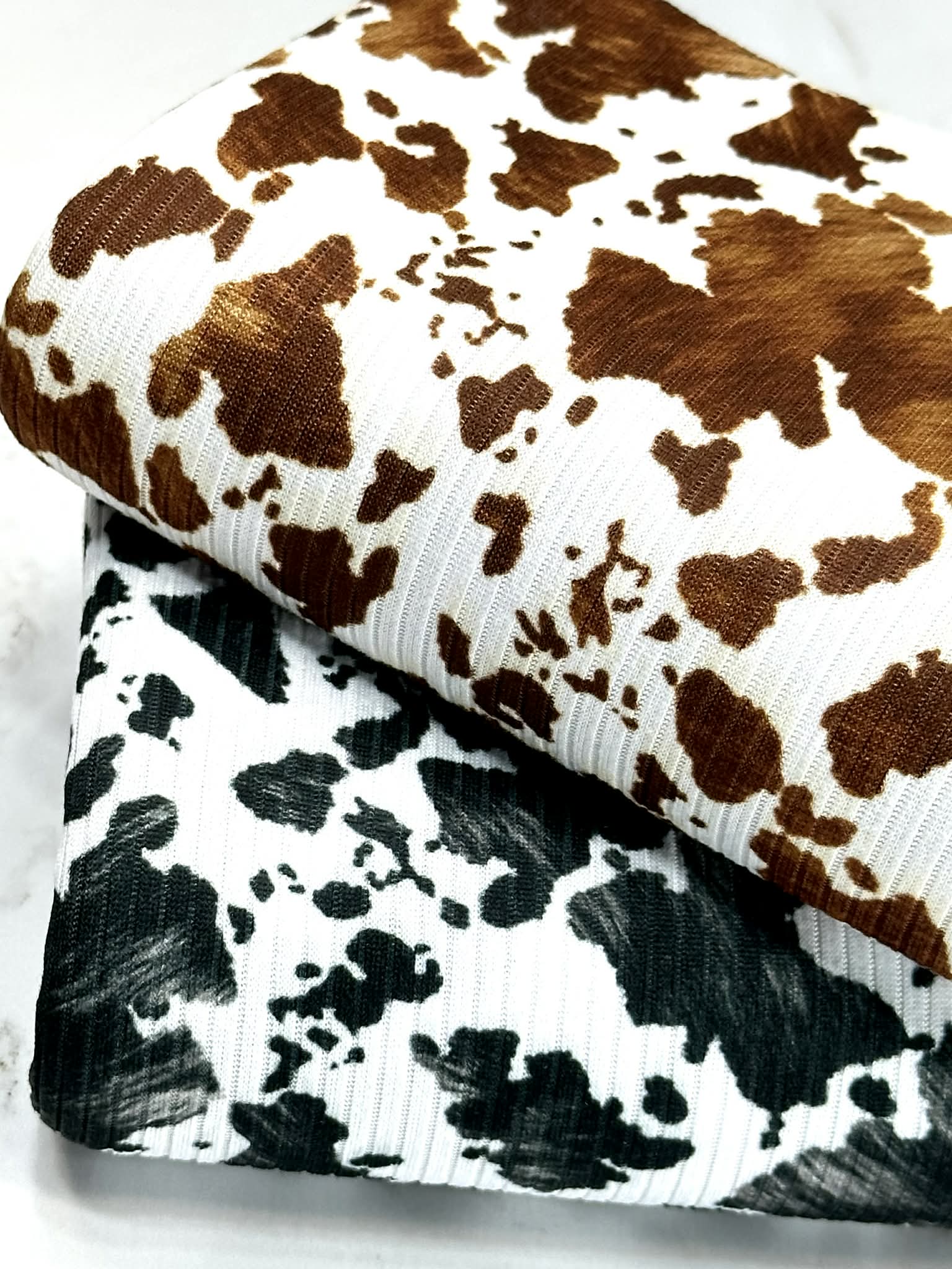(4X2 YUMMY RIB) SMALL BLACK COW FUR PRINT ON OFF WHITE