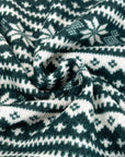 (SWEATER KNIT) SMALL IVORY POINSETTIAS ON DARK GREEN