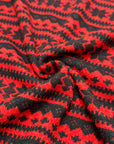 (SWEATER KNIT) SMALL BLACK POINSETTIAS ON SCARLET RED